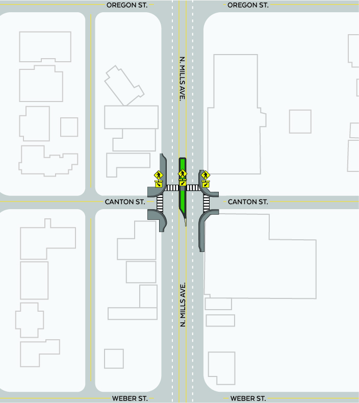 Plan-view rendering of proposed pedestrian safety upgrades on US 17/Mills Ave at Canton Street. Shows a new midblock-style crosswalk with curb extensions, ADA ramps, a raised refuge island, channelized turns, updated markings, and pedestrian/ RRFB signs. Nearby streets and surrounding buildings are visible.