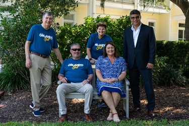 Mayor Dyer and multiple other officials taking a photo together.