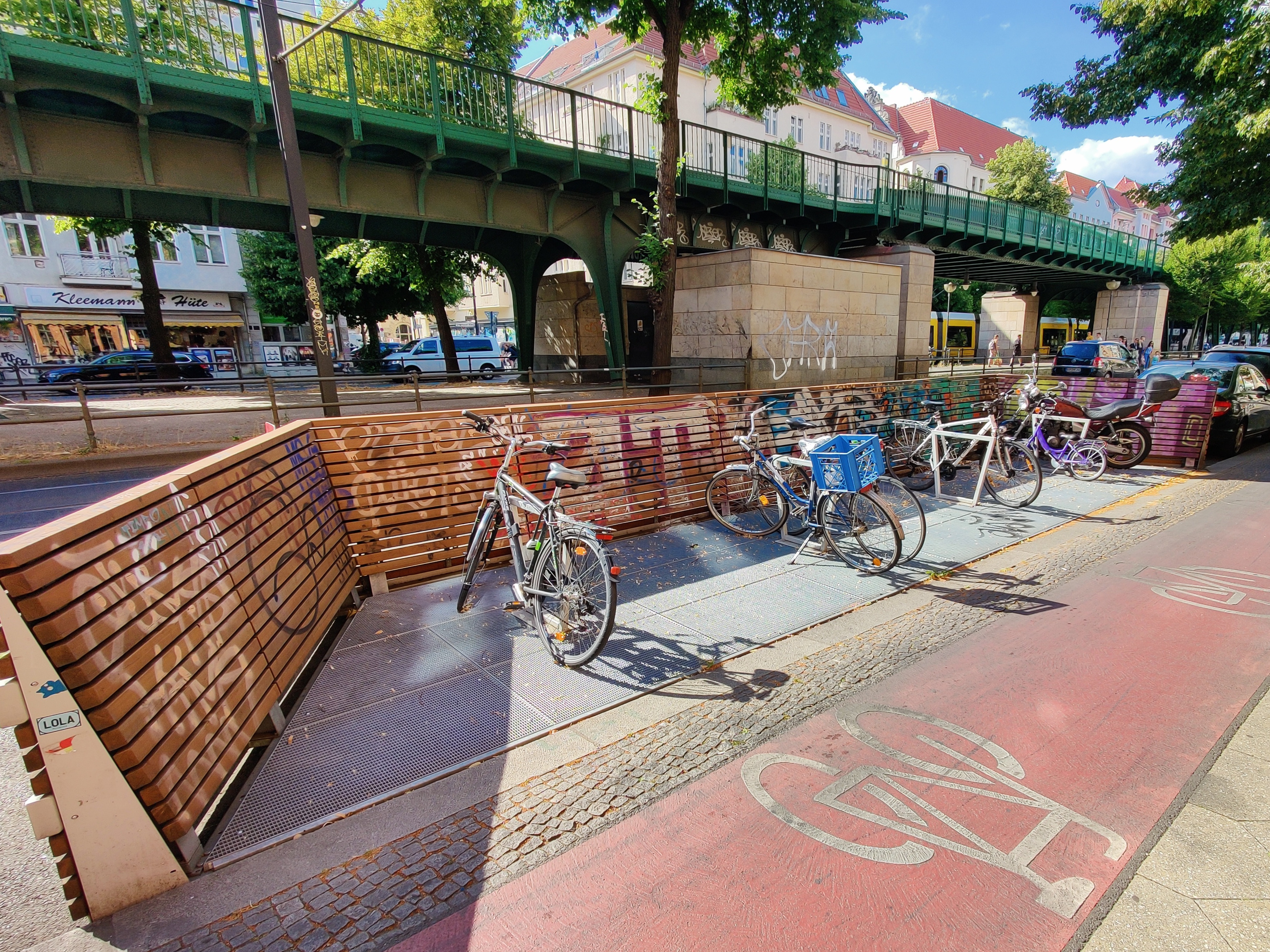 A photo of a bicycle parking area within a parklet.