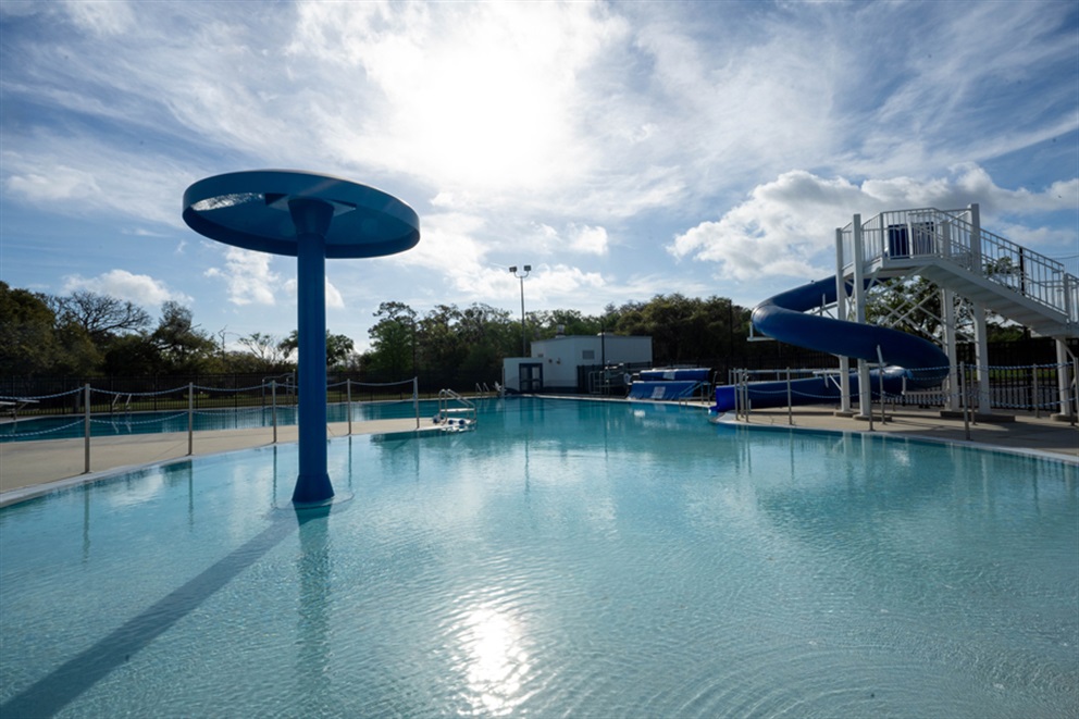 Smith pool with water slide and fountain.
